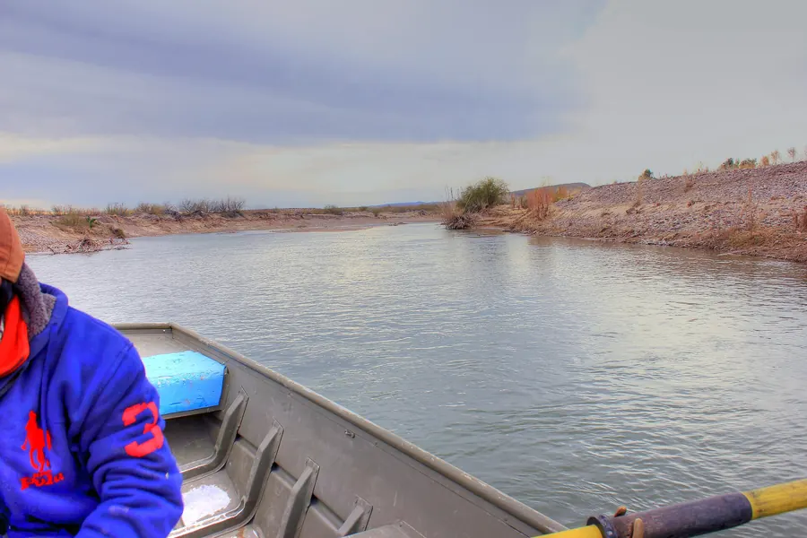 Crossing the Rio Grande by small boat