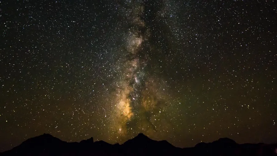The Milky Way over the desert mountains